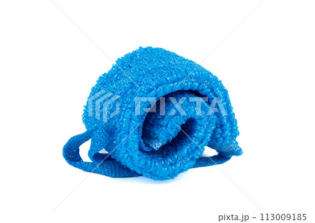 Spun blue sponge made of polypropylene strands insulated on a white background. Spun blue sponge made of polypropylene strands insulated on a white background. 113009185