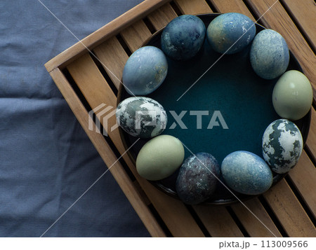 Blue painted easter eggs 113009566