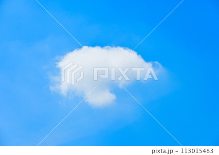 beautiful blue sky and white fluffy single cloud with sunrise in the morning, natural background 113015483