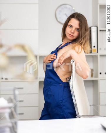 Naked female cleaning service worker in office 113016305