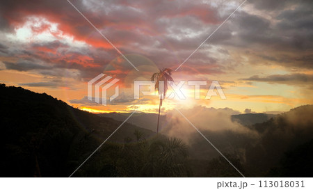 Evening view of sunset with mountain and hill background. Nature beauty concept. 113018031