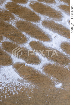 white powdered sugar with cookie crumbs 113018858