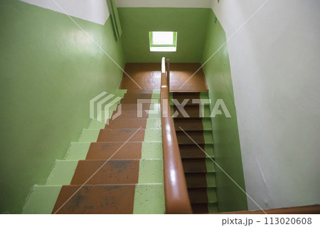 Green staircase in the office corridor. Green staircase in the office corridor. 113020608