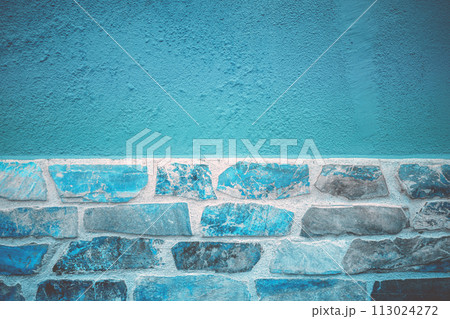 Abstract blue grunge concrete and brick wall background Abstract blue grunge concrete and brick wall background 113024272