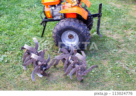 cutters complete with walk-behind tractor for work on the ground. Technique for agriculture. Motor cultivator cutters complete with walk-behind tractor for work on the ground. Technique for agriculture. Motor cultivator 113024776