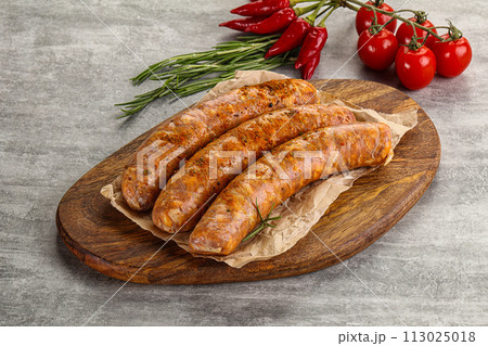Raw sausages with spices and herbs Raw sausages with spices and herbs 113025018