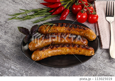 Grilled meat sausages with spices Grilled meat sausages with spices 113025019
