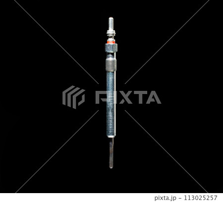 Modern glow plug with a ceramic rod for a diesel engine on a black background, isolate, close-up. Heating element of the combustion chamber of a car, starting the engine in cold temperatures in Modern glow plug with a ceramic rod for a diesel engine on a black background, isolate, close-up. Heating element of the combustion chamber of a car, starting the engine in cold temperatures in 113025257