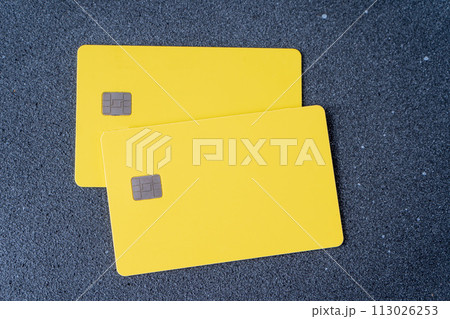 Yellow credit card with chip. Bank cards mockup Yellow credit card with chip. Bank cards mockup 113026253