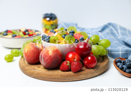 Tasty and healthy nutrition concept - fruit salad Tasty and healthy nutrition concept - fruit salad 113028129