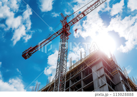 AI-generated content. Large construction site with busy tower cranes at high-rise building with aerial top view Generative AI 113028888