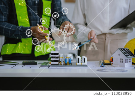 Engineer Teamwork Meeting, Drawing working on blueprint meeting for project working with partner on model building at company office. Asian industry professional team Engineer Teamwork Meeting, Drawing working on blueprint meeting for project working with partner on model building at company office. Asian industry professional team 113028950