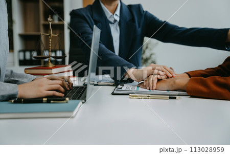 Legal advisers encourage clients. Justice and lawyer concept in the office. 113028959