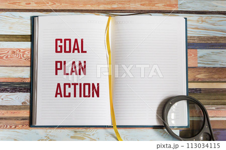 Goal, plan, action concepts with text in notepad and magnifying glass. Goal, plan, action concepts with text in notepad and magnifying glass. 113034115