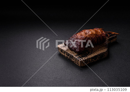 Delicious smoked meat pork or chicken with salt, spices and herbs 113035109