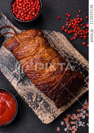 Delicious smoked meat pork or chicken with salt, spices and herbs Delicious smoked meat pork or chicken with salt, spices and herbs 113035136