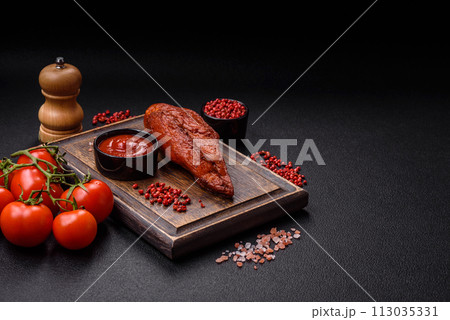 Delicious smoked meat chicken breast with salt, spices and herbs 113035331