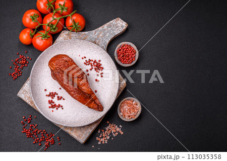 Delicious smoked meat chicken breast with salt, spices and herbs 113035358