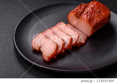 Delicious smoked meat chicken breast with salt, spices and herbs Delicious smoked meat chicken breast with salt, spices and herbs 113035364