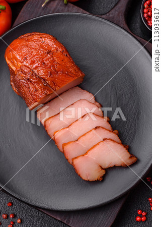 Delicious smoked meat chicken breast with salt, spices and herbs Delicious smoked meat chicken breast with salt, spices and herbs 113035617