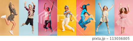 Energetic collage made of dynamic photos of happy, smiling children dancing in motion against multicolored studio background. 113036805