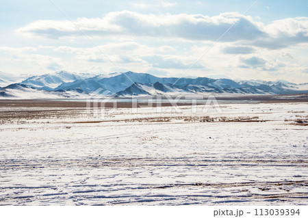 Snow mountain steppe in Mongolia. 113039394