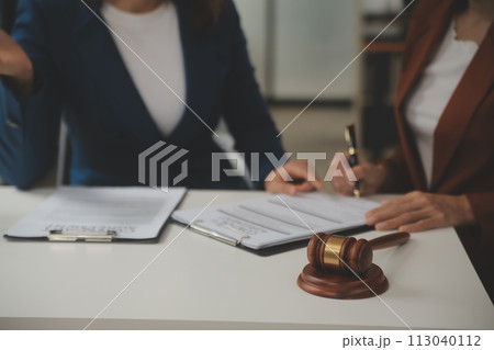 Lawyer, legal advisor, businessman brainstorming information on agreement details Business contracts in legal processing books for accuracy in contract documents. joint financial investment. Lawyer, legal advisor, businessman brainstorming information on agreement details Business contracts in legal processing books for accuracy in contract documents. joint financial investment. 113040112