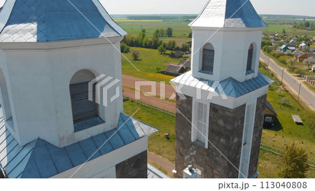 The Catholic Church of Our Lady of Ruzhantsova in the village of Radun. Belarus. Aerial view. The Catholic Church of Our Lady of Ruzhantsova in the village of Radun. Belarus. Aerial view. 113040808
