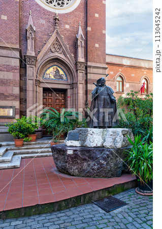 Bronze statue of Pope John Paul II standing outside St. Anthony of Padua, the largest Catholic church in Istanbul 113045242