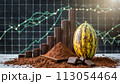 Cocoa fruit with dark chocolate and chocolate powder on the stock trading board graph in the background 113054464