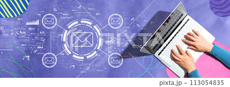 Email concept with person using a laptop Email concept with person using a laptop 113054835