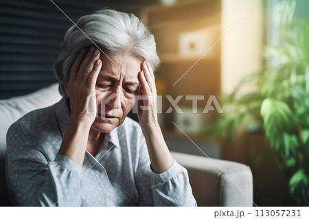 Senior woman suffering from headache or dizziness 113057231