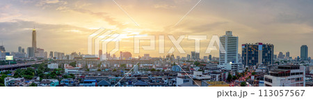 Panorama aerial view of Bangkok city on sunset in Thailand. Cityscape of buildings and urban architecture. 113057567