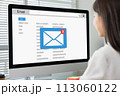 Businesswoman sitting using computer with checking email inbox on website. 113060122