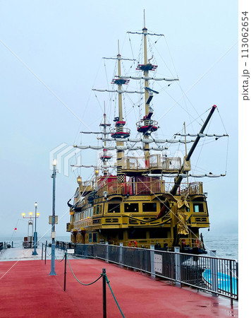 Pier to Pirate ship in Lake Ashi Ashinoko Hakone Japan sightseeing boat rainy day 113062654