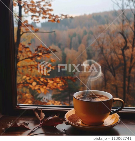 Coffee mug with smoke next to window overlooking autumn trees Vertical banner with copy space for Instagram stories. 113062741
