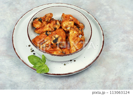 Homemade baked or fried chicken wings. Homemade baked or fried chicken wings. 113063124