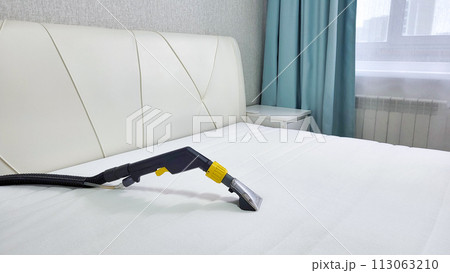 Mattress dry cleaning using a professional machine and chemicals. Dry cleaning at home. 113063210