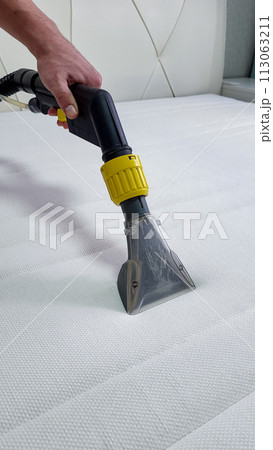 cleaning company cleans the mattress. General cleaning of the mattress. 113063211
