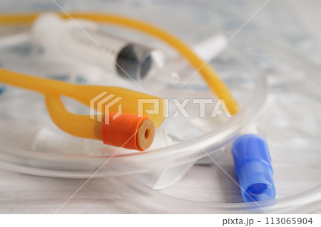 Foley catheter and urine drainage bag collect urine for disability or patient in hospital. 113065904