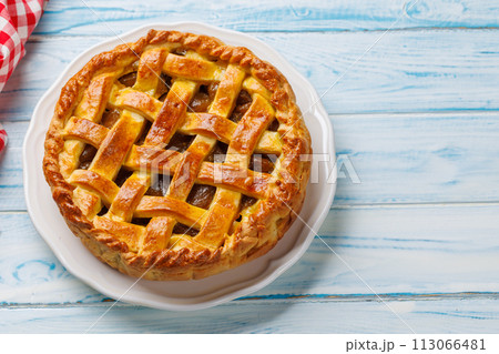 Delicious Apple Pie with Fresh Red Apples 113066481