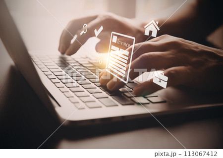 Man typing on a laptop. Invoice concept Man typing on a laptop. Invoice concept 113067412