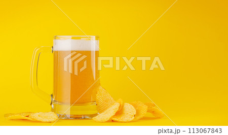 Beer and potato chips 113067843