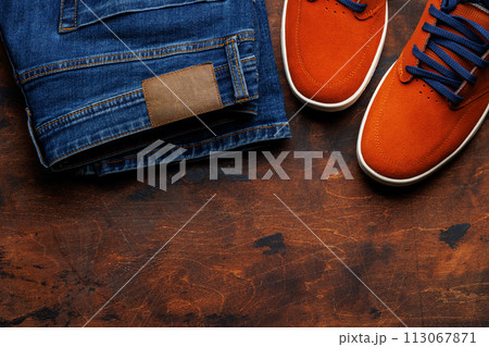 Men's Clothing on wooden Background Men's Clothing on wooden Background 113067871