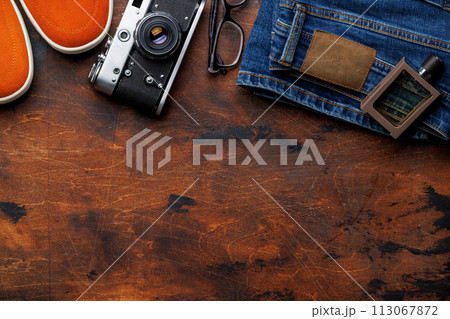 Men's Clothing on wooden Background Men's Clothing on wooden Background 113067872