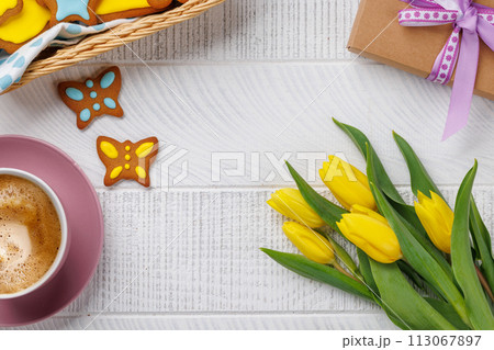 Easter Gingerbread Cookies, Yellow Tulips, and Coffee Cup 113067897