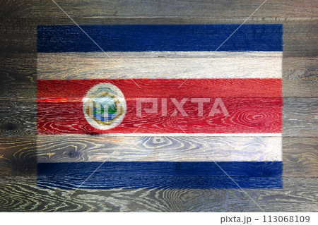 Costa Rica flag on rustic old wood surface background 113068109