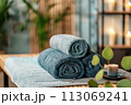 Towels on massage table in spa salon 113069241