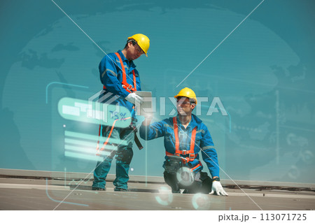 Engineers install solae cell on the roof of factory Engineers install solae cell on the roof of factory 113071725