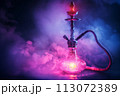 hookah with glass flask on black background of shisha smoke with neon light 113072389